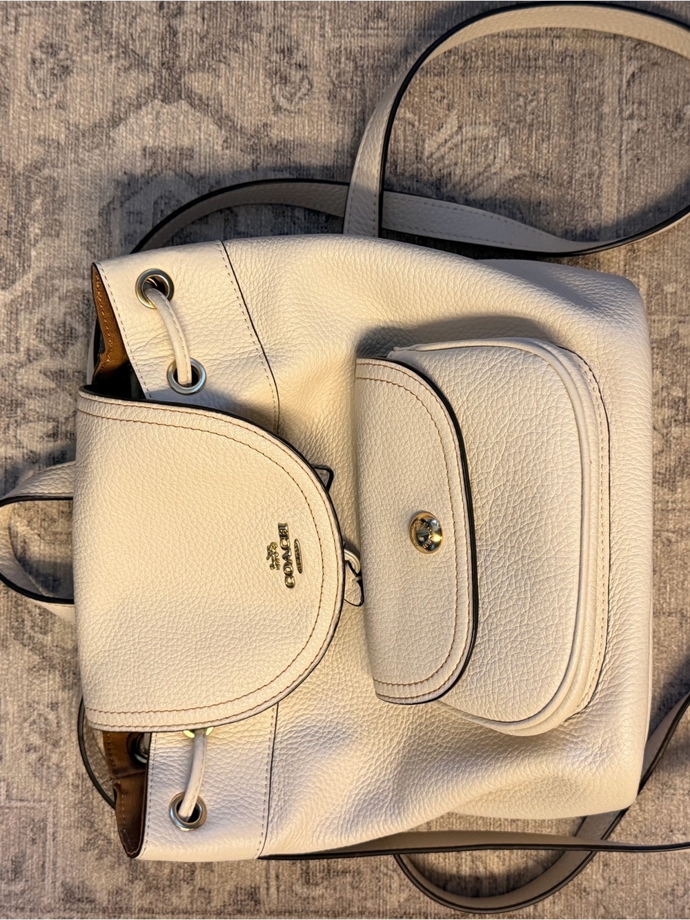 Coach Pebbled Leather Drawstring Backpack in Cream